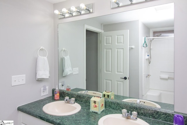 bathroom with vanity and walk in shower