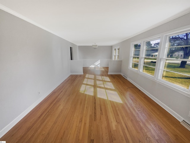 empty room with light hardwood / wood-style floors