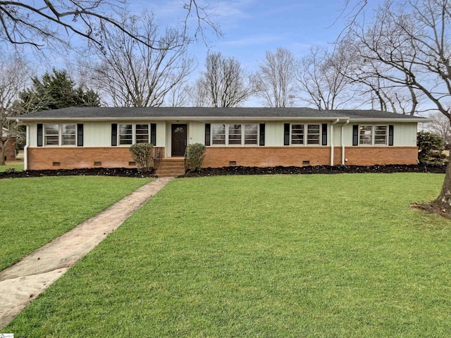 single story home featuring a front lawn