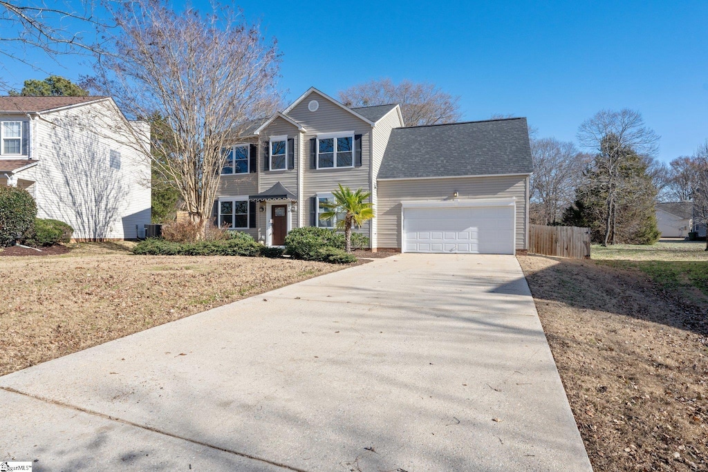 front facade with a garage