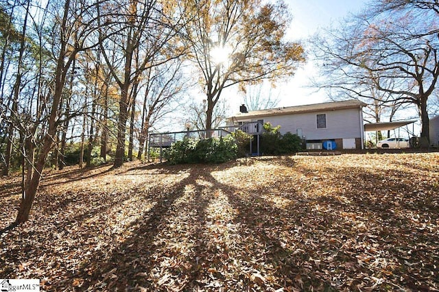 view of yard with a carport