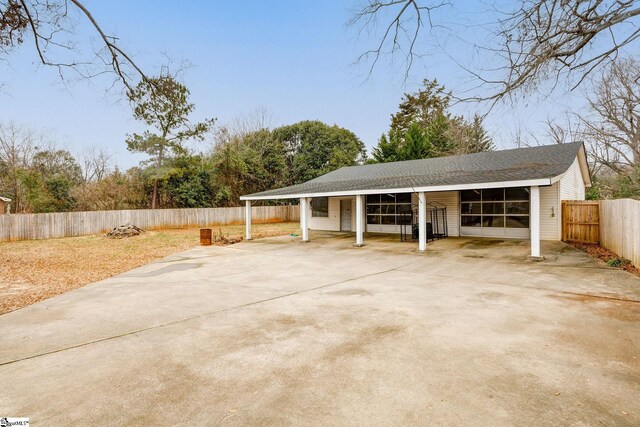 exterior space featuring a carport