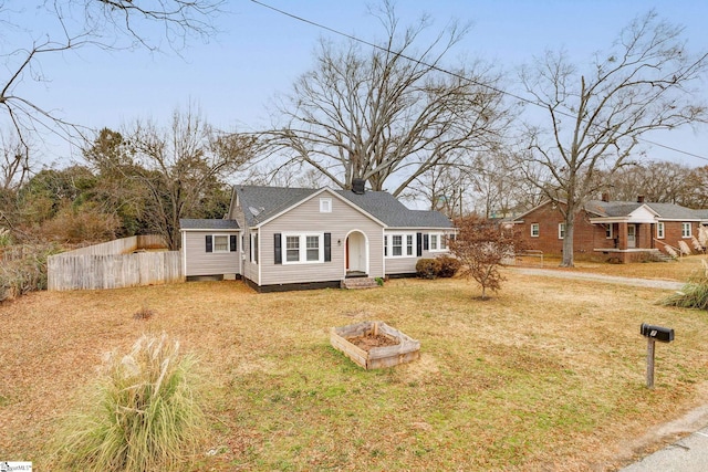 view of front of house with a front lawn