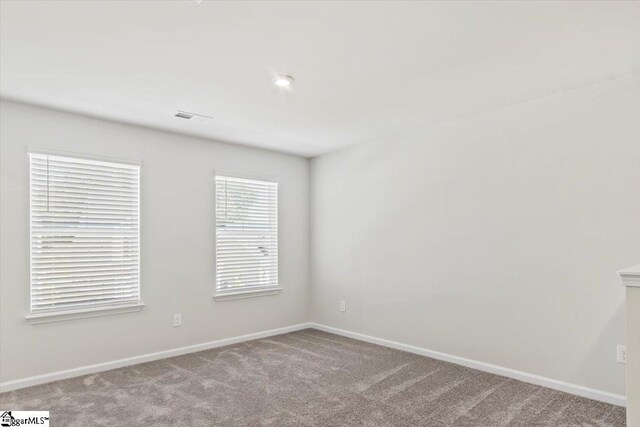 view of carpeted spare room