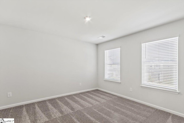 empty room with carpet floors