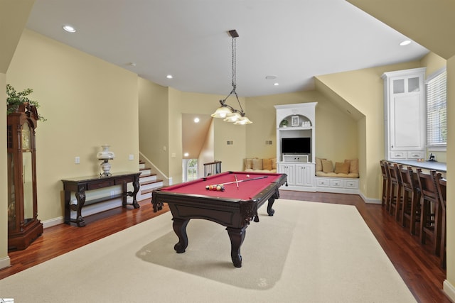 playroom featuring built in features, dark wood-type flooring, and billiards