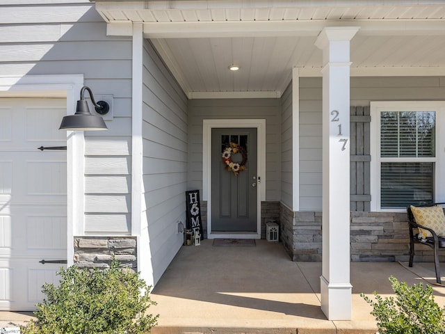 entrance to property featuring a garage