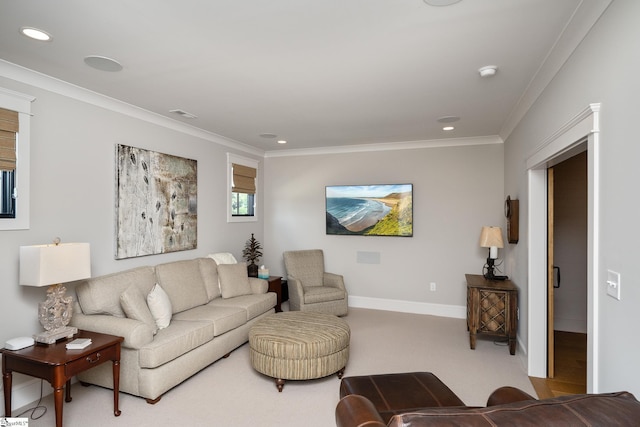 carpeted living room with ornamental molding