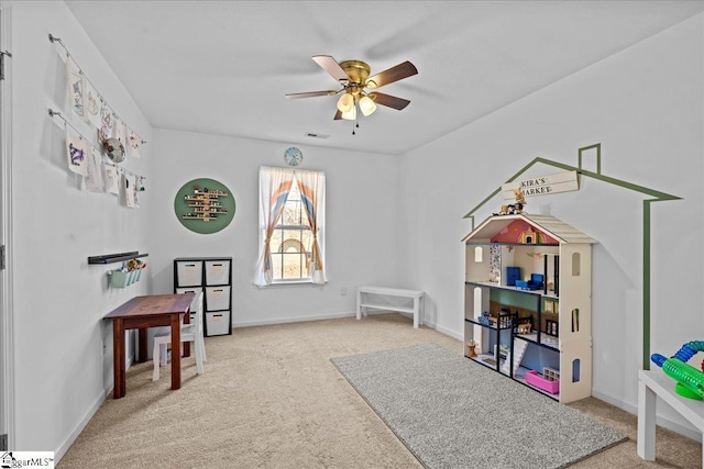 game room featuring ceiling fan and carpet