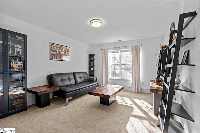 living room featuring light carpet