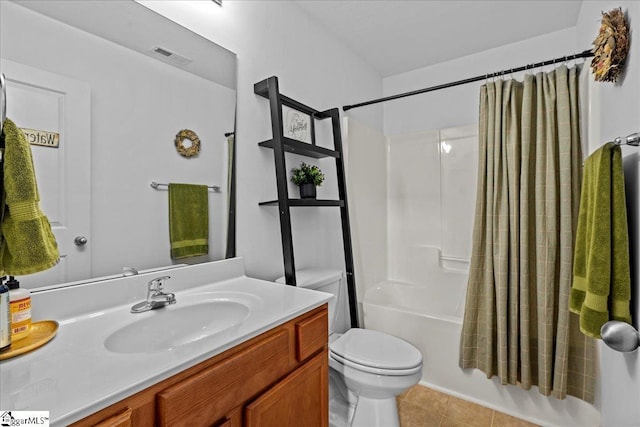 full bathroom with tile patterned floors, vanity, shower / bath combo, and toilet