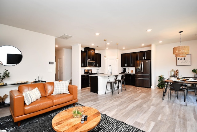 living room featuring light wood-type flooring