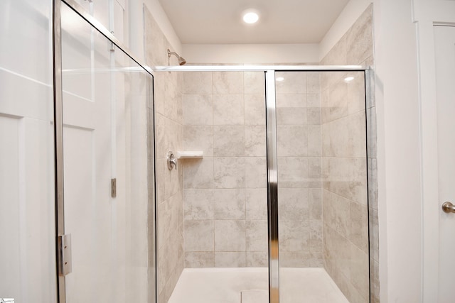 bathroom featuring an enclosed shower