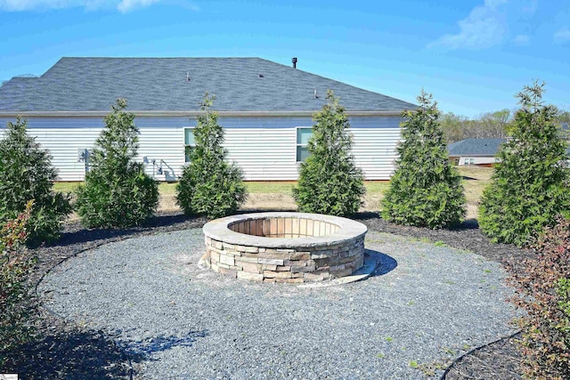 view of patio with an outdoor fire pit