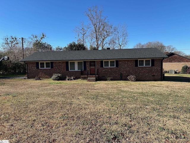 single story home with a front yard