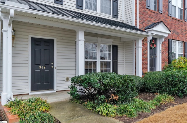 property entrance with a porch