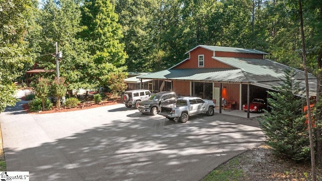 view of front of property with a carport