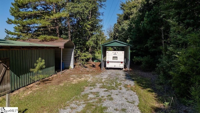 view of yard featuring a carport