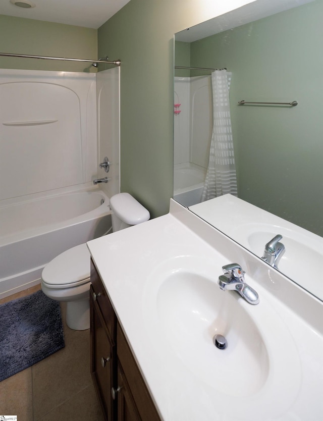 bathroom with tile patterned floors, vanity, and toilet