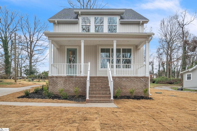 view of front of home featuring covered porch