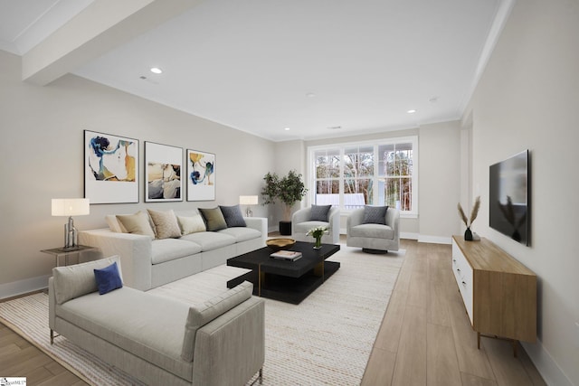 living room featuring crown molding and light hardwood / wood-style flooring