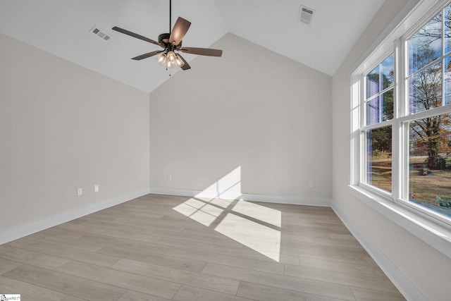 interior space with light hardwood / wood-style floors, vaulted ceiling, and ceiling fan