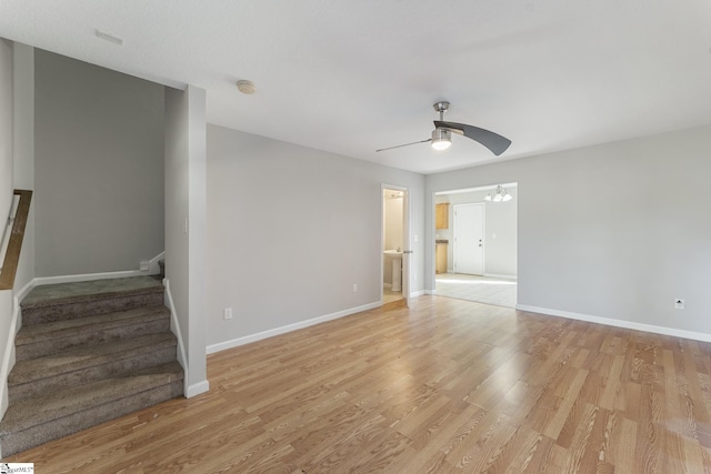 empty room featuring light hardwood / wood-style floors and ceiling fan