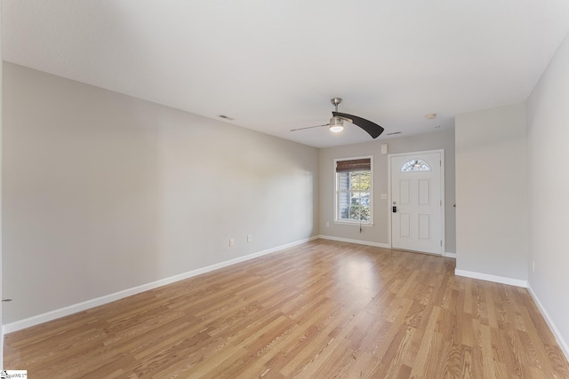 entryway featuring ceiling fan and light hardwood / wood-style floors