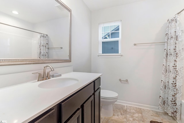 full bathroom featuring vanity, toilet, and shower / tub combo