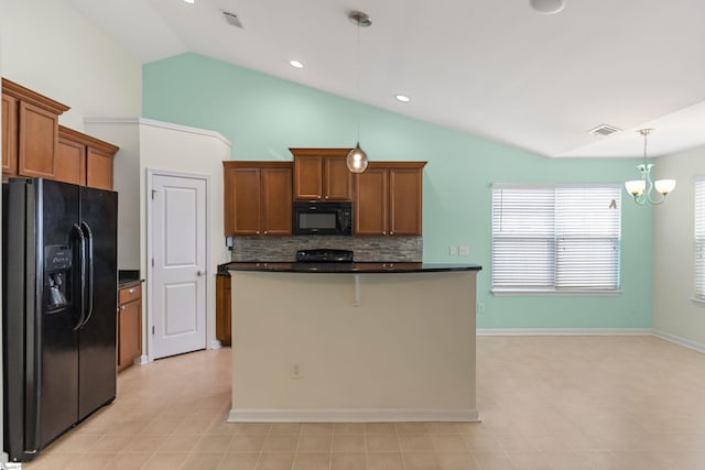 kitchen with tasteful backsplash, a notable chandelier, pendant lighting, vaulted ceiling, and black appliances