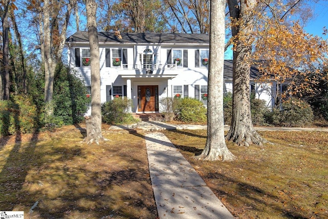 view of front of home with a balcony