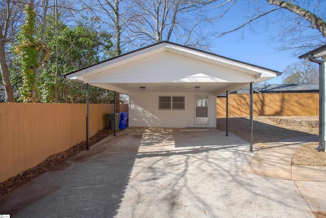 rear view of house with a carport