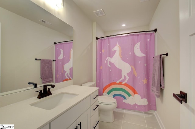 bathroom with tile patterned floors, vanity, toilet, and a shower with curtain