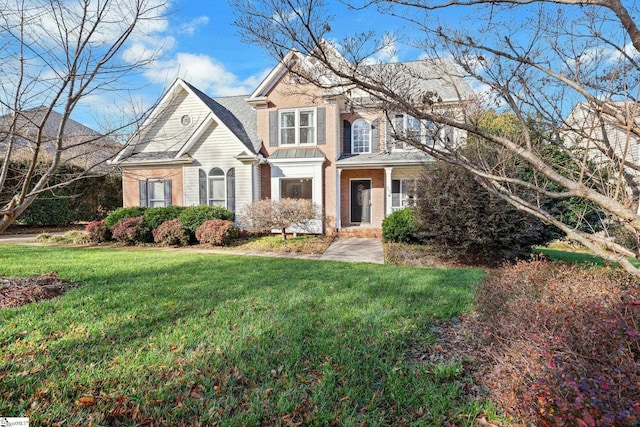 view of front of home featuring a front lawn