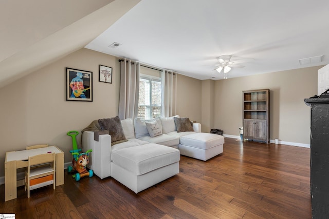 living room with vaulted ceiling, ceiling fan, and dark hardwood / wood-style floors