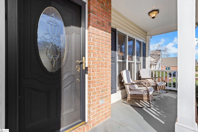 property entrance with a porch