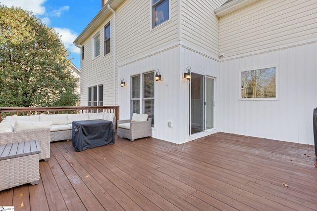 wooden deck with an outdoor hangout area