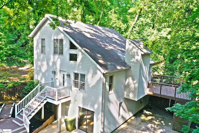 rear view of property with a deck