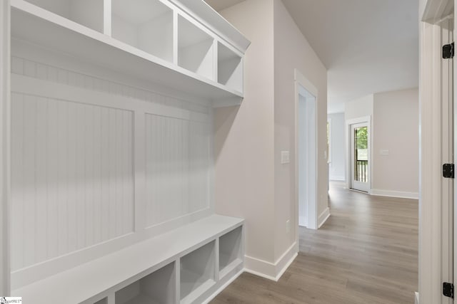 mudroom with hardwood / wood-style floors