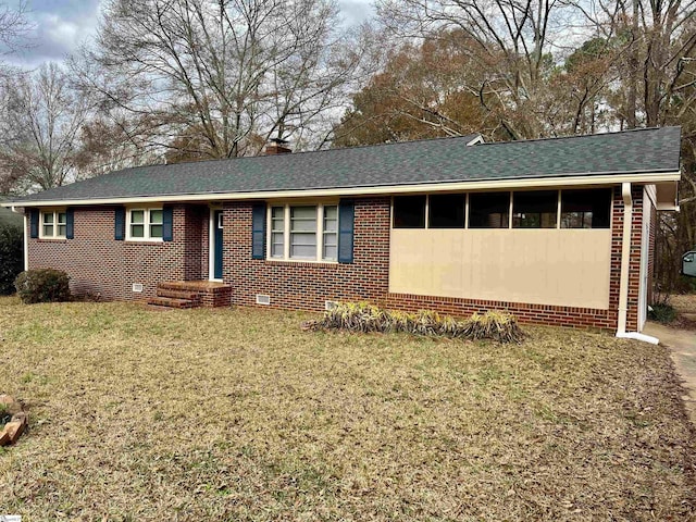 single story home with a front yard