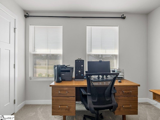 office space with light colored carpet