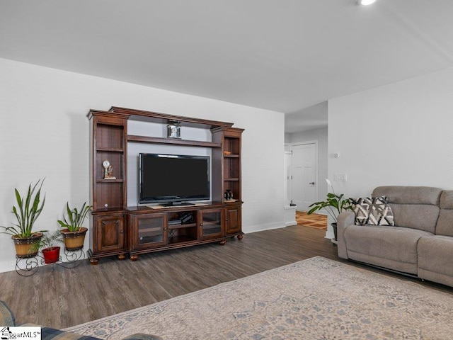 living room featuring dark hardwood / wood-style flooring