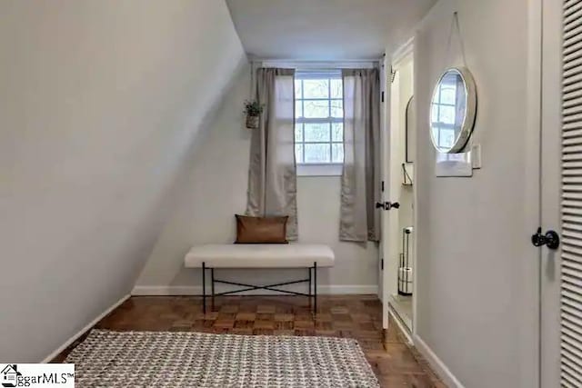 doorway with dark parquet floors