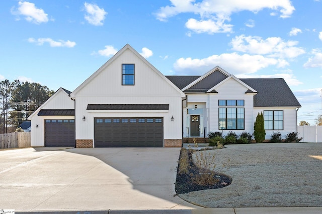 modern inspired farmhouse with a garage