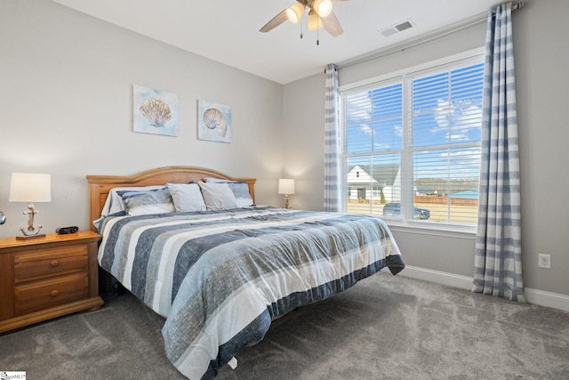 bedroom with ceiling fan and carpet floors