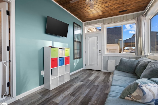 living room with dark hardwood / wood-style floors and wood ceiling