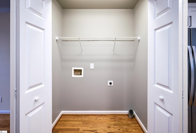 washroom with washer hookup, electric dryer hookup, and wood-type flooring