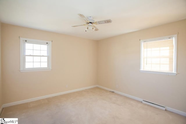 carpeted empty room with ceiling fan