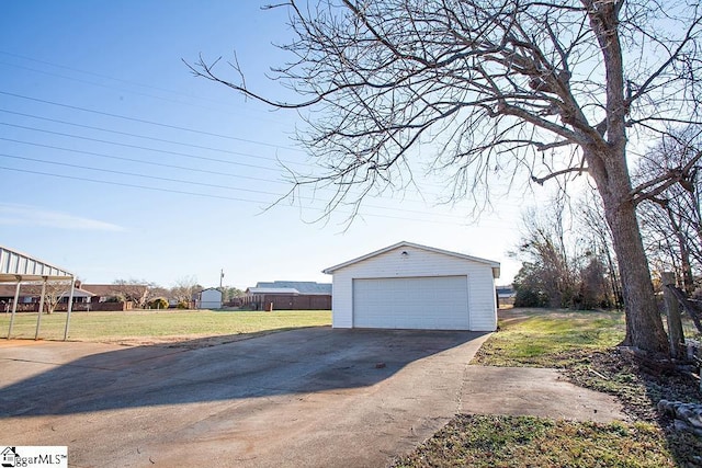 garage with a yard