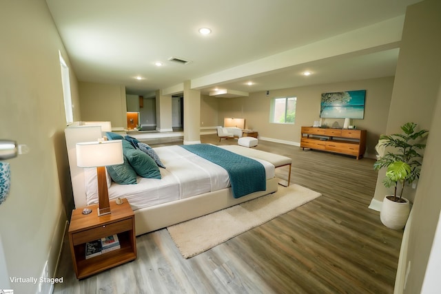 bedroom featuring wood-type flooring